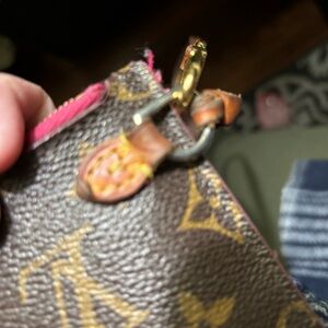 Authentic Louis Vuitton Neverfull pink pivone pouch monogram wristlet